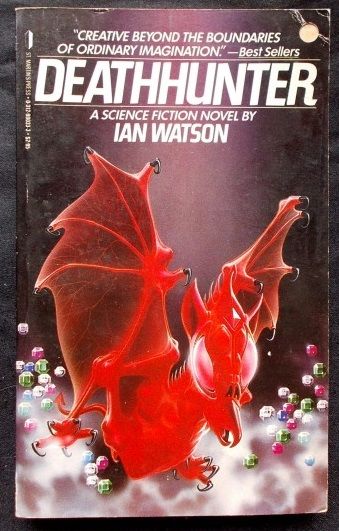 Lush, slightly corny cover art depicting an alien red bat with huge eyes. It hovers in a cloud of fog alongside dozens of multicoloured gems, which unfortunately look a fair bit like Candy Crush.