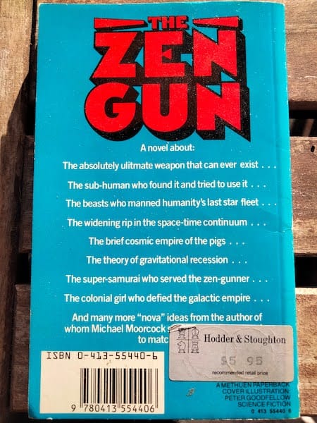 bright blue back cover of the book, promising contents including "the absolutely ulitmate weapon that can ever exist", "the brief cosmic empire of the pigs" and "the super-samurai who served the zen gunner"