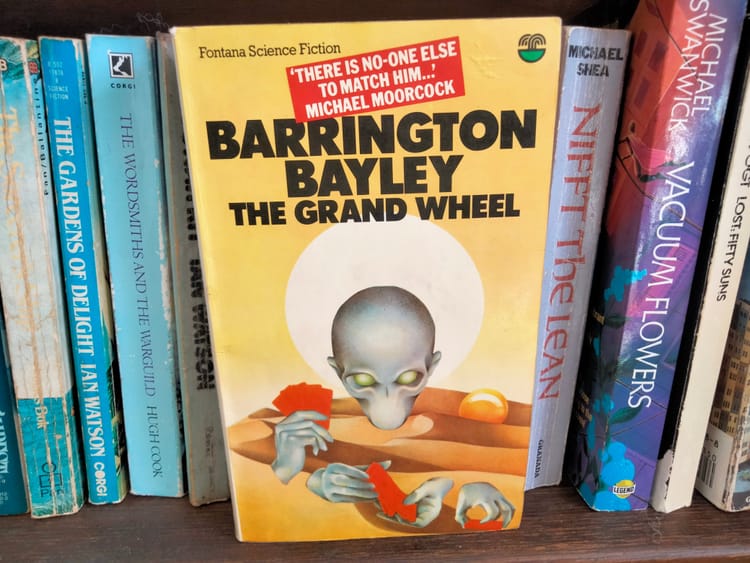 Cover art depicting an alien playing cards with four hands.